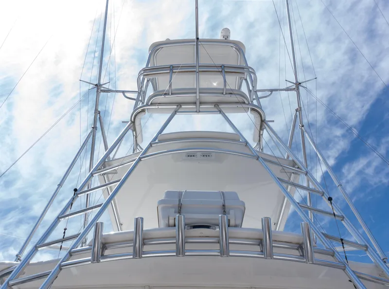 Slide: The Image of 2008 Cabo 38 Express yacht tower against a blue sky. - 25