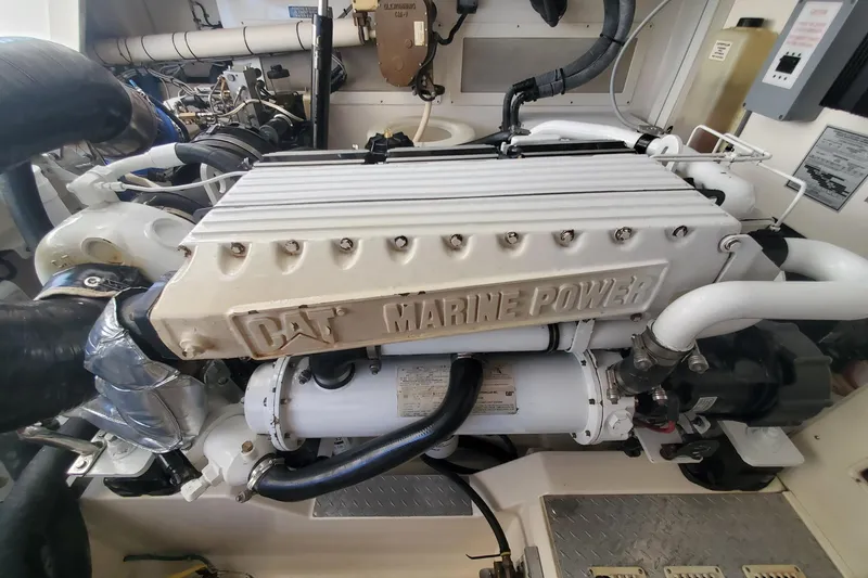 Slide: The Image of CAT Marine Power engine in a 2008 Cabo 38 Express boat. - 33