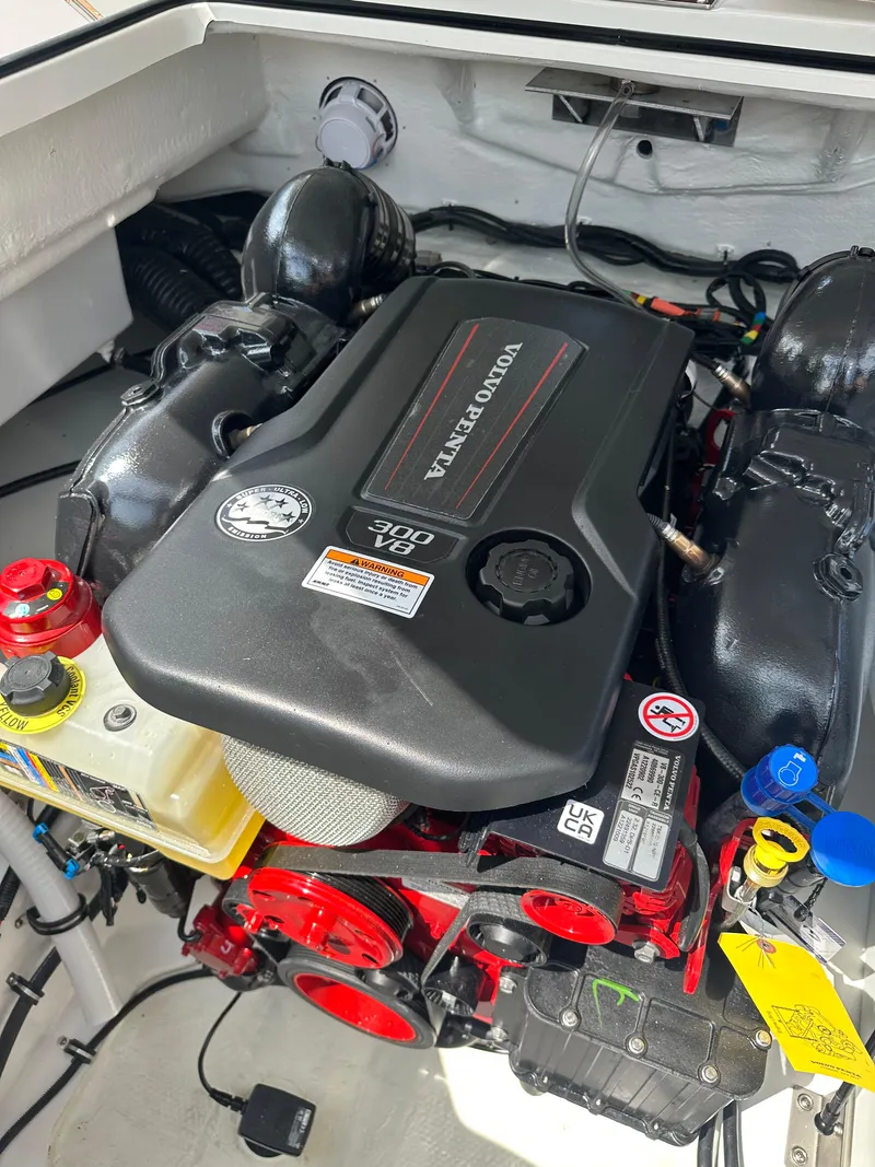 Slide: The Image of 2024 Cobalt R4 boat engine compartment with Volvo Penta engine. - 13