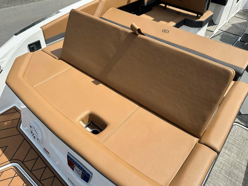 Slide: The Image of 2024 Cobalt R4 boat with tan leather seating and modern design. - 15