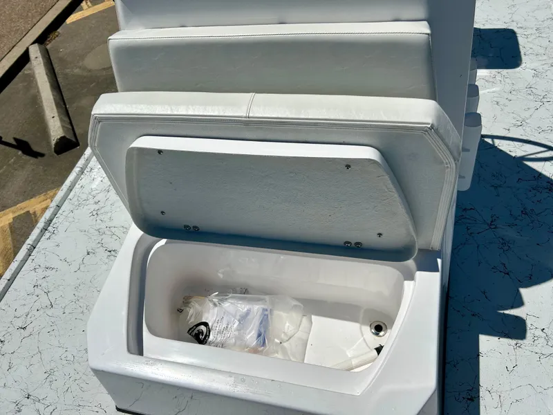 Slide: The Image of Open storage compartment on 2024 Shallow Stalker 17 LTS boat. - 10