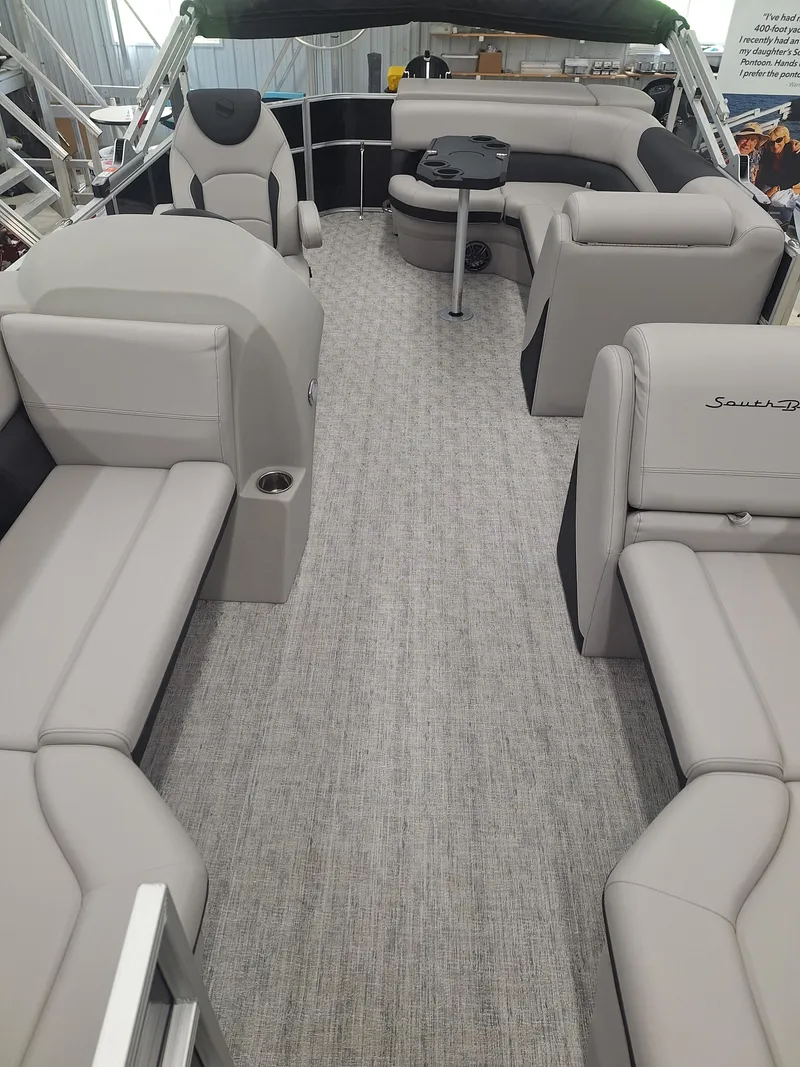 Slide: The Image of 2024 South Bay 222CRLE pontoon boat interior with luxurious seating and modern design. - 5