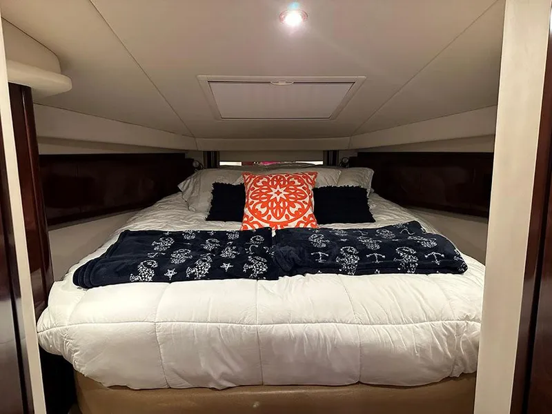 Slide: The Image of Luxurious bedroom in 2009 Sea Ray 40 Sundancer yacht with cozy bedding. - 10