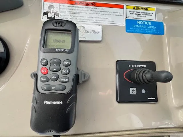 Slide: The Image of Raymarine RAY240 VHF radio and thruster control on 2009 Sea Ray 40 Sundancer. - 22