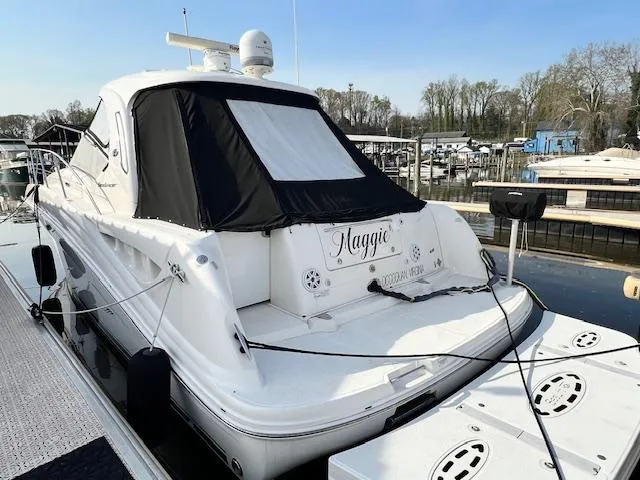 Slide: The Image of 2009 Sea Ray 40 Sundancer yacht docked at marina. - 4