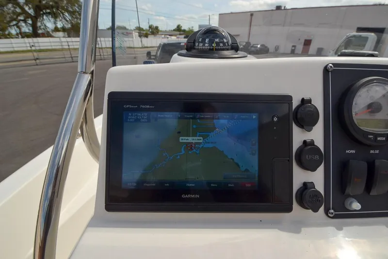 Slide: The Image of Garmin navigation system on 2019 Boston Whaler 180 Dauntless boat dashboard. - 15