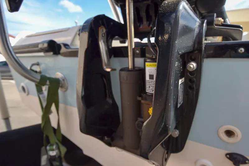 Slide: The Image of Close-up of the engine mount on a 2019 Boston Whaler 180 Dauntless boat. - 4