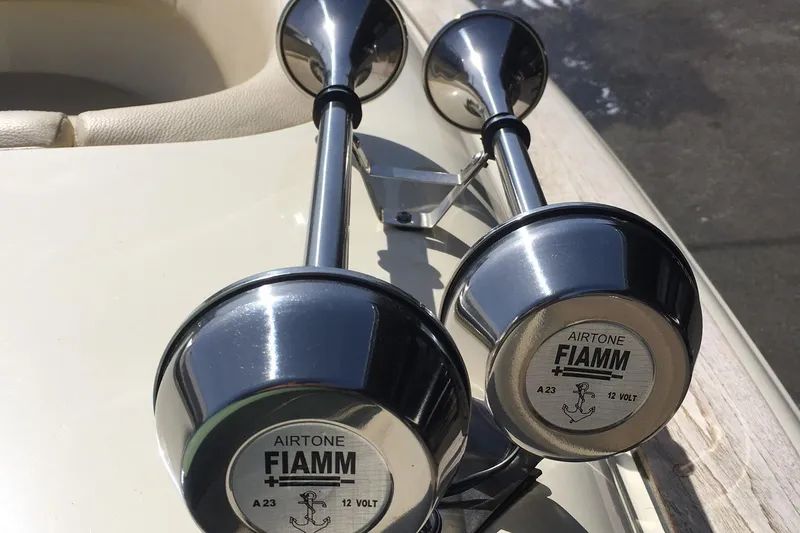 Slide: The Image of Close-up of FIAMM Airtone horns on a 2019 Chris-Craft Launch 27 boat. - 18