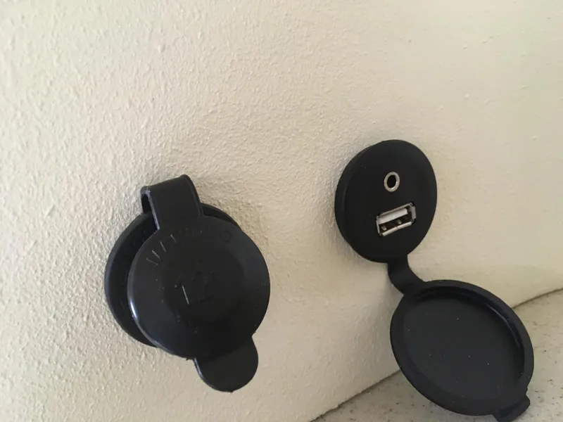 Slide: The Image of 2019 Chris-Craft Launch 27 USB and auxiliary port on interior wall. - 20