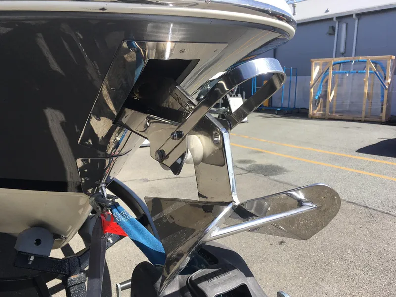 Slide: The Image of 2019 Chris-Craft Launch 27 boat anchor detail in a marina. - 23