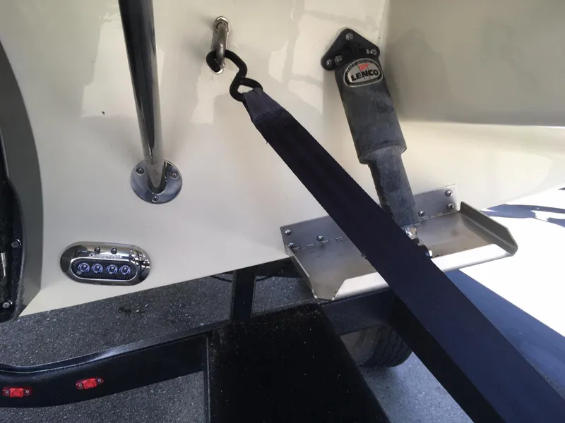 Slide: The Image of 2019 Chris-Craft Launch 27 boat stern with trailer and trim tab. - 32