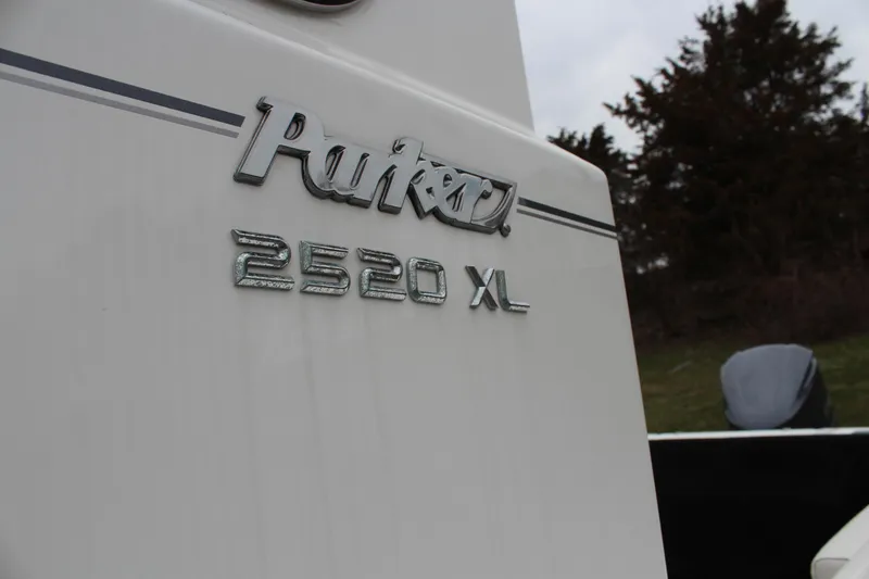 Slide: The Image of Parker 2520 XL Deep Vee Sport Cabin boat, 2020 model, close-up of logo. - 11