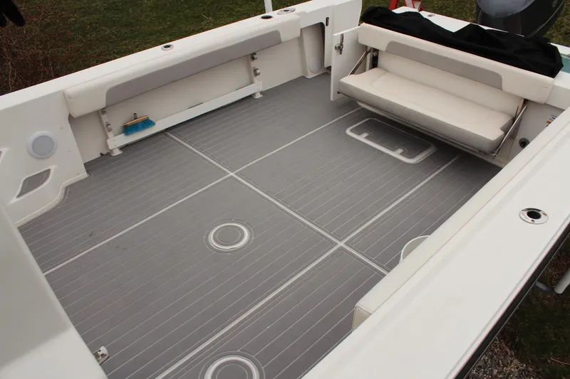 Slide: The Image of 2020 Parker 2520 XL Deep Vee Sport Cabin boat interior with spacious deck and seating. - 15