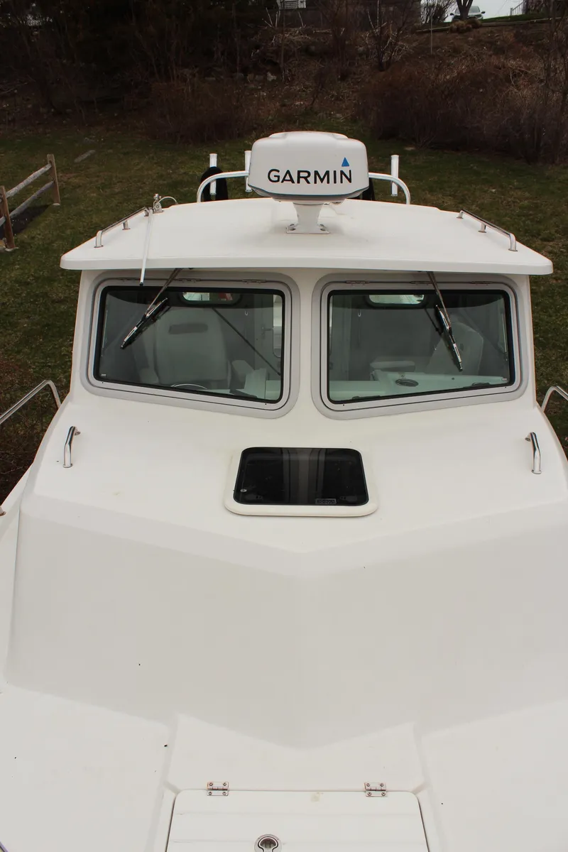 Slide: The Image of 2020 Parker 2520 XL Deep Vee Sport Cabin boat with Garmin equipment. - 21