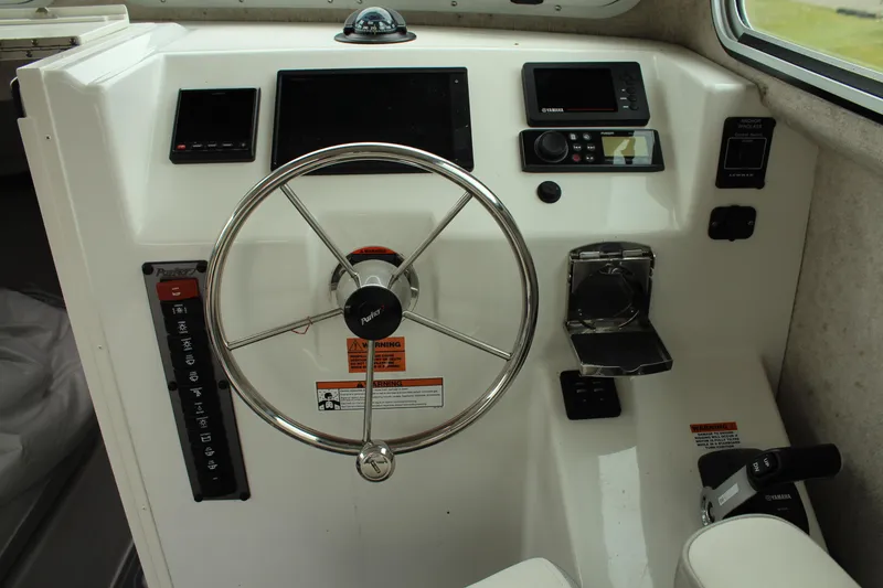Slide: The Image of Steering console of 2020 Parker 2520 XL Deep Vee Sport Cabin boat. - 35