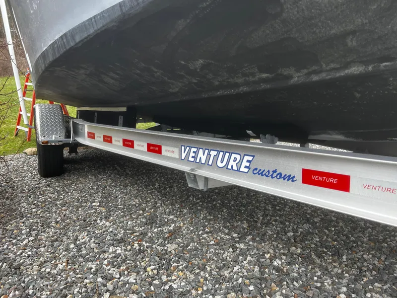 Slide: The Image of Trailer for 2020 Parker 2520 XL Deep Vee Sport Cabin on gravel. - 43