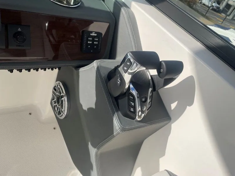 Slide: The Image of 2024 Chaparral 280 OSX boat controls and dashboard detail. - 22