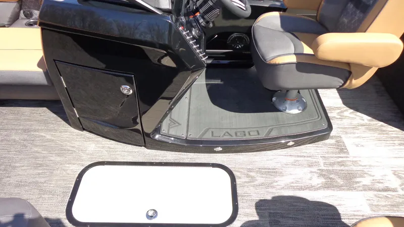Slide: The Image of 2024 Viaggio Lago Z24U boat interior with captain's chair and control console. - 15