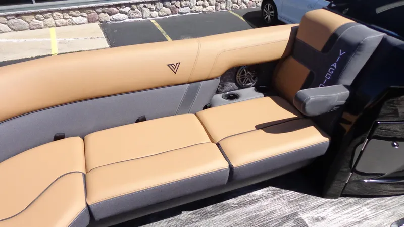 Slide: The Image of 2024 Viaggio Lago Z24U boat with tan and gray seating. - 17