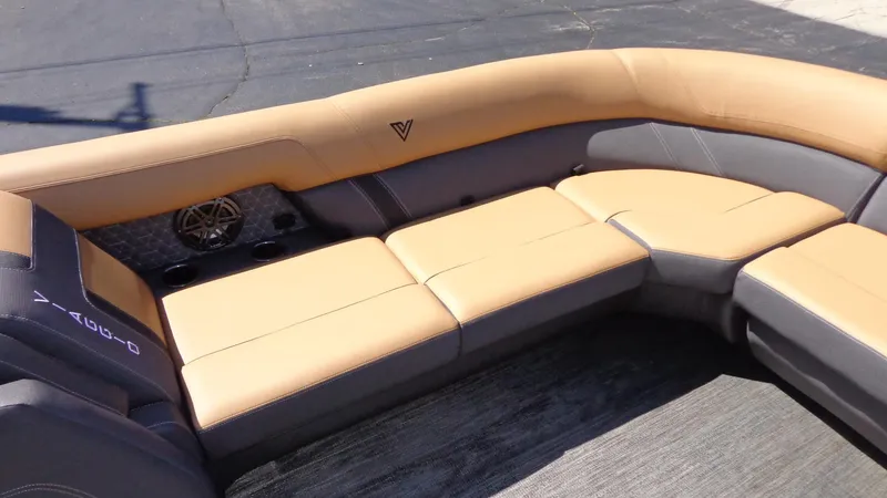 Slide: The Image of 2024 Viaggio Lago Z24U boat with tan and gray seating. - 20