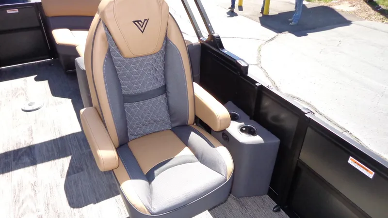 Slide: The Image of 2024 Viaggio Lago Z24U boat seat with cup holders and armrests. - 24