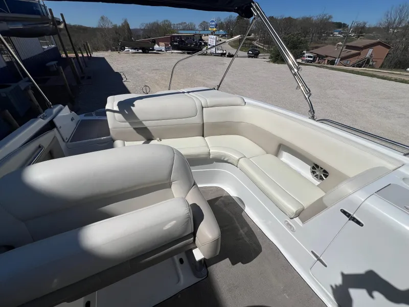 Slide: The Image of Interior of a 1997 Cobalt 23 boat with white leather seating. - 6