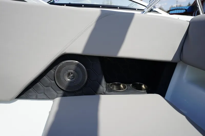 Slide: The Image of 2023 Four Winns H1 boat interior with speaker and cup holders. - 20