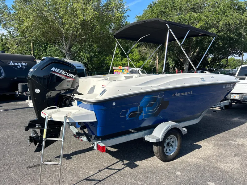 Slide: The Image of 2022 Bayliner Element E18 boat with Mercury outboard motor on trailer. - 3