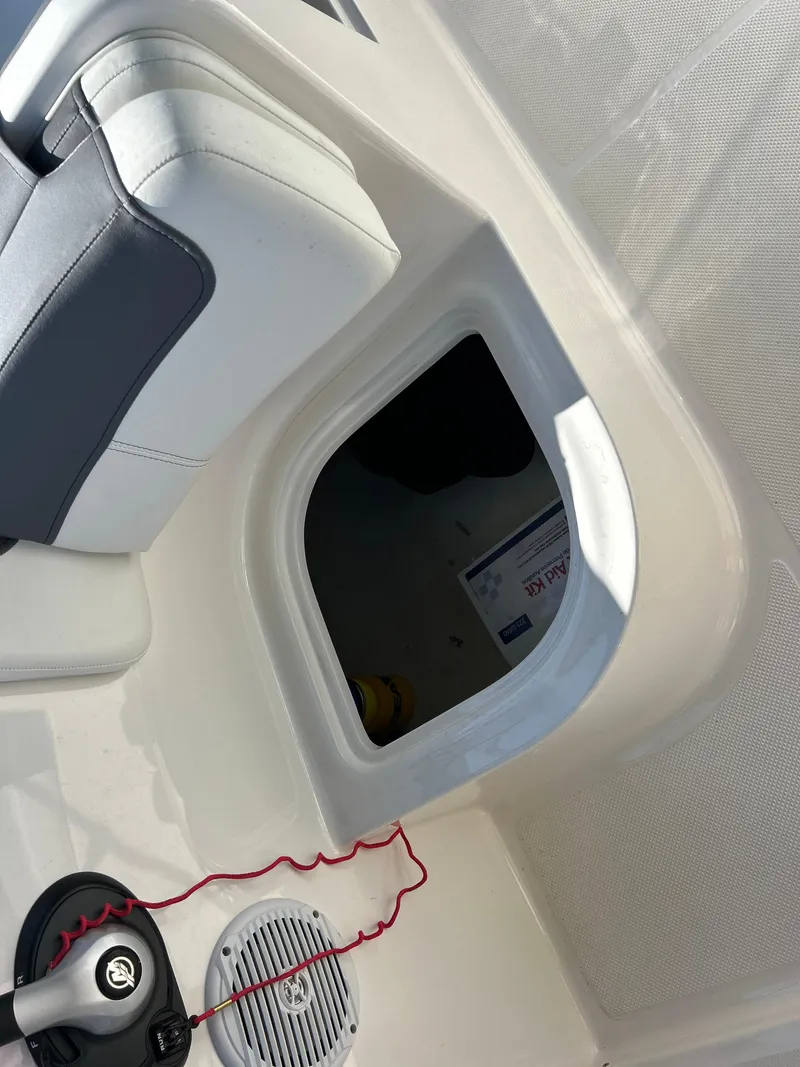 Slide: The Image of 2022 Bayliner Element E18 boat interior storage compartment. - 30