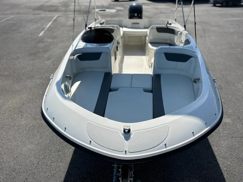 Slide: The Image of 2022 Bayliner Element E18 boat with spacious seating and modern design. - 8