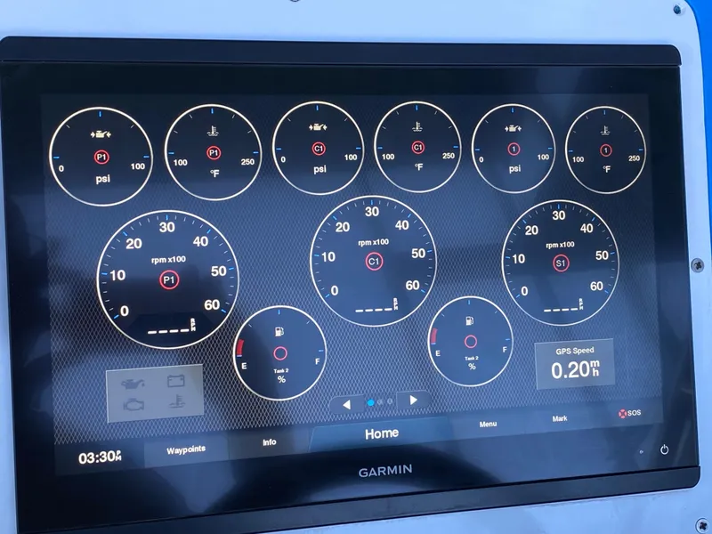 Slide: The Image of Garmin display showing gauges on 1988 Warlock 37 Cat Cruiser. - 14