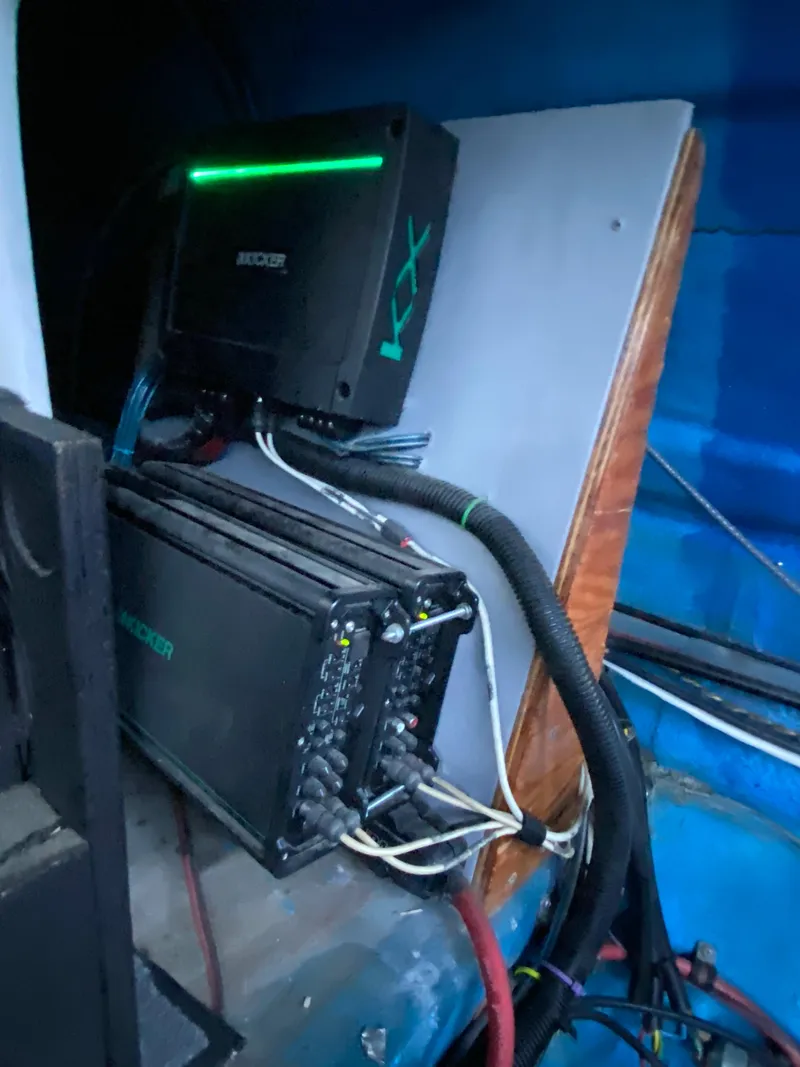 Slide: The Image of Audio equipment setup in a 1988 Warlock 37 Cat Cruiser boat. - 19