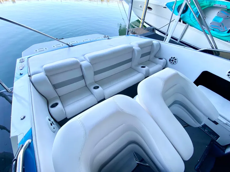 Slide: The Image of 1988 Warlock 37 Cat Cruiser interior with white and gray seating. - 9