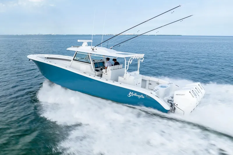Slide: The Image of 2024 Yellowfin 42 boat cruising on open water. - 3