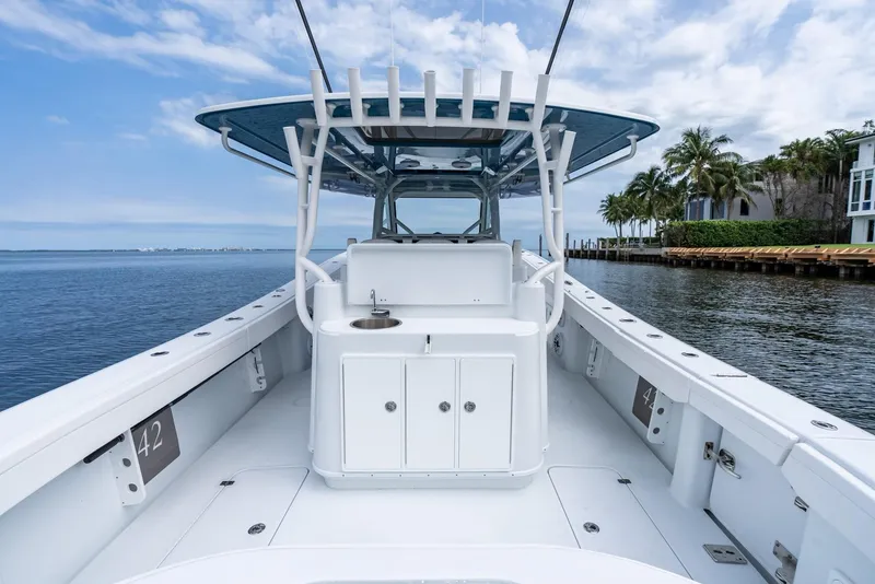 Slide: The Image of 2024 Yellowfin 42 boat with center console on calm waters. - 30