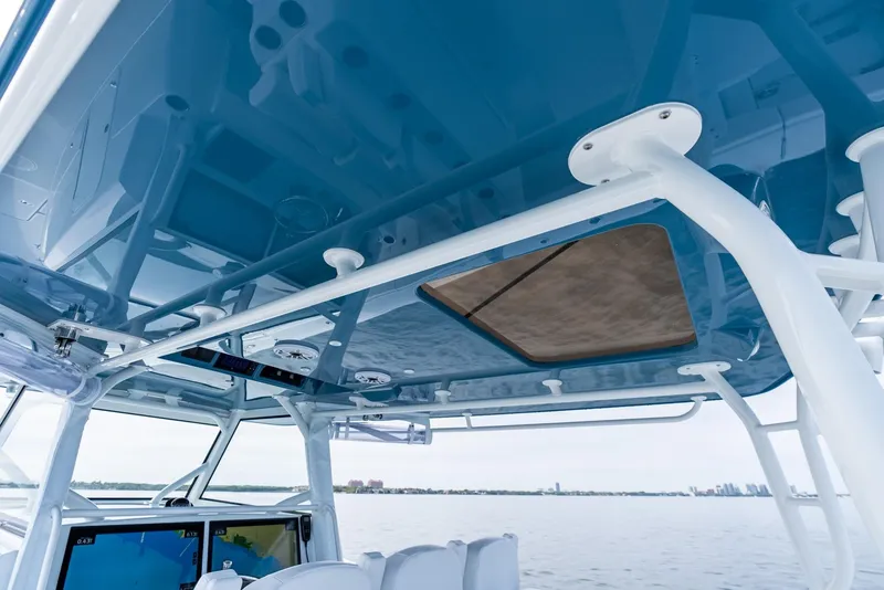 Slide: The Image of 2024 Yellowfin 42 boat interior with blue ceiling and advanced navigation systems. - 38