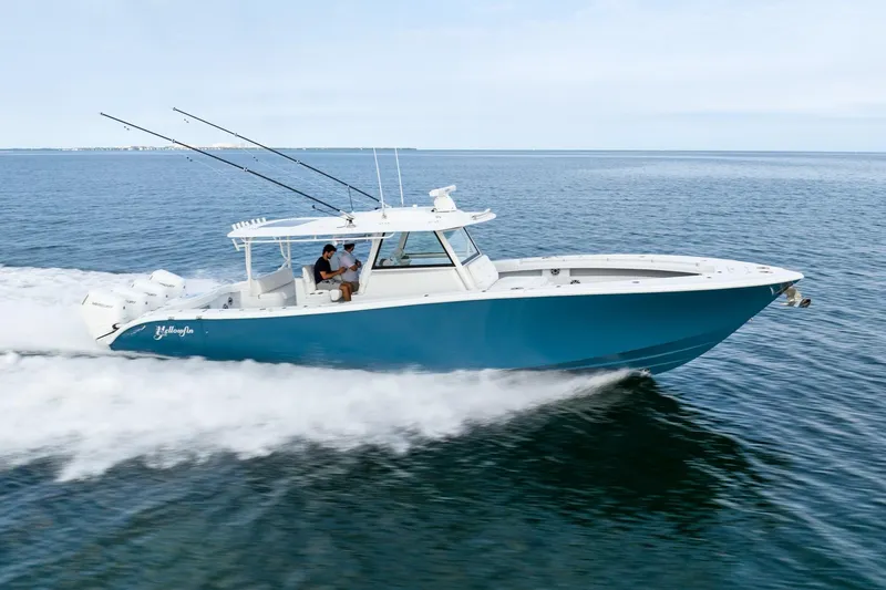 Slide: The Image of 2024 Yellowfin 42 boat cruising on open water. - 4