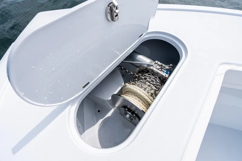 Slide: The Image of Anchor storage compartment on a 2024 Yellowfin 42 boat. - 44
