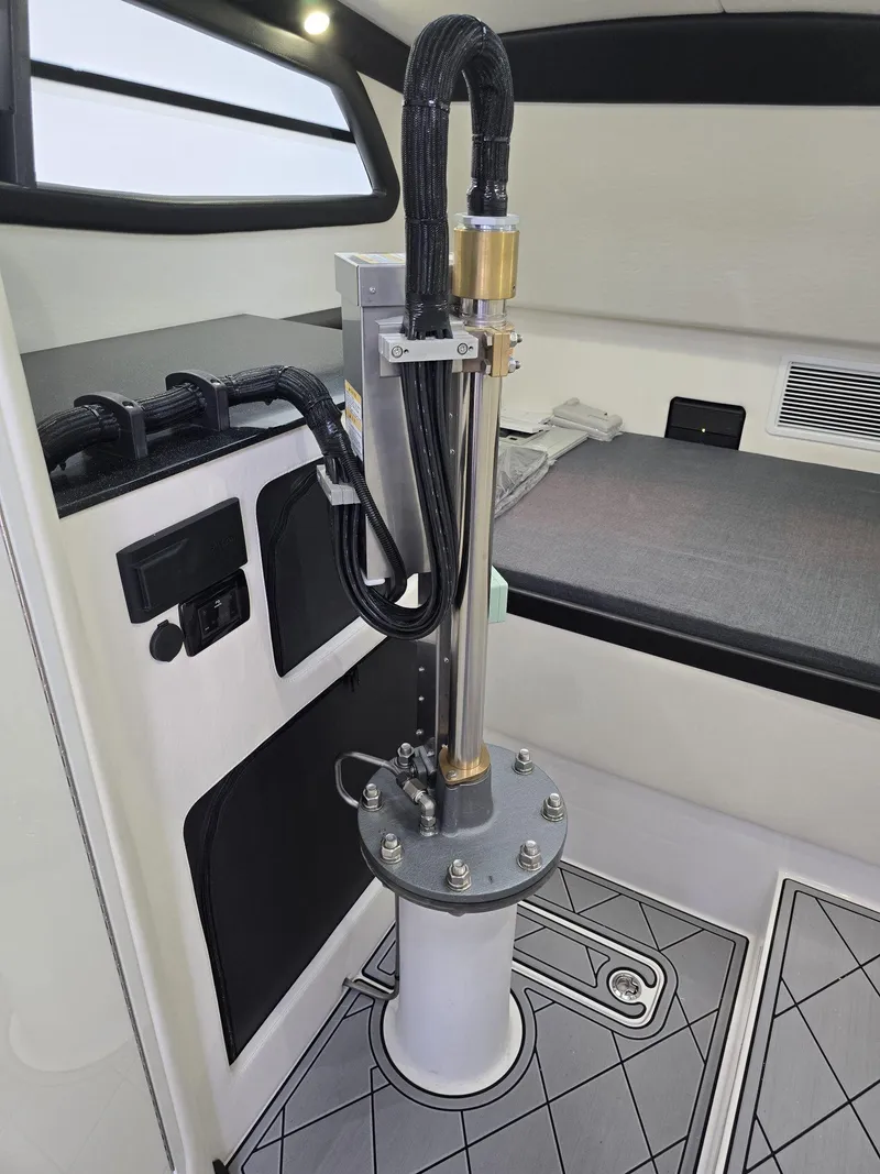 Slide: The Image of Interior of 2024 Nor-Tech 452 Super Fish boat showing advanced mechanical equipment. - 12