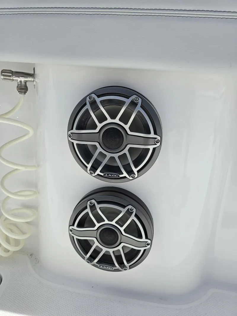 Slide: The Image of Close-up of JL Audio speakers on a 2024 Nor-Tech 452 Super Fish boat. - 15