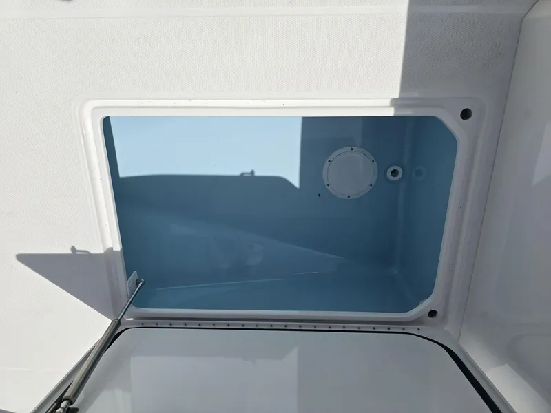Slide: The Image of Open storage compartment of 2024 Nor-Tech 452 Super Fish boat. - 28