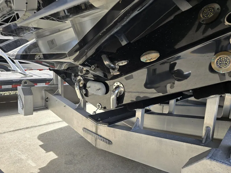 Slide: The Image of Close-up of the 2024 Nor-Tech 452 Super Fish boat hull on a trailer. - 30