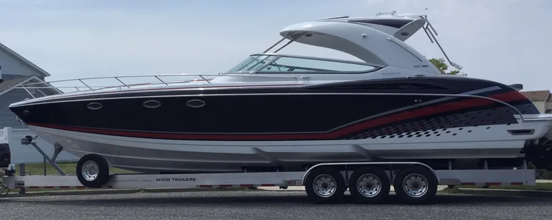 Slide: The Image of 2015 Formula 400 FX8 boat on a trailer. - 2
