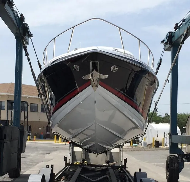 Slide: The Image of 2015 Formula 400 FX8 boat being lifted for maintenance. - 9