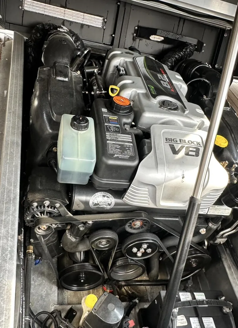 Slide: The Image of 2014 Bennington 2550 QSR boat engine compartment with Big Block V8 engine. - 19