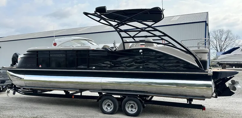Slide: The Image of 2014 Bennington 2550 QSR pontoon boat on a trailer. - 4