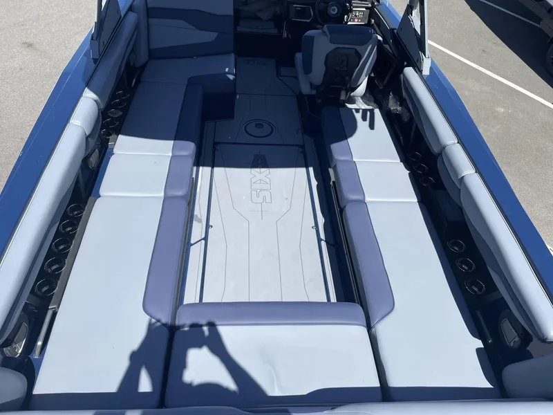 Slide: The Image of 2024 Axis T250 boat interior with spacious seating and modern design. - 10