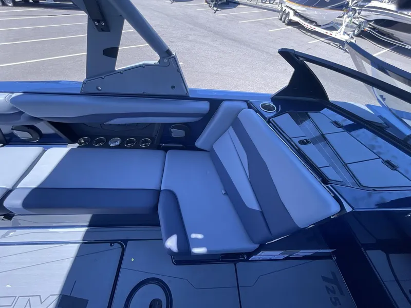 Slide: The Image of 2024 Axis T250 boat interior with sleek seating and modern design features. - 14