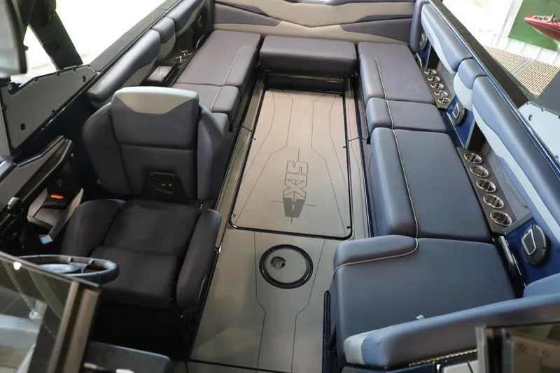 Slide: The Image of 2024 Axis T250 boat interior with spacious seating and modern design. - 12