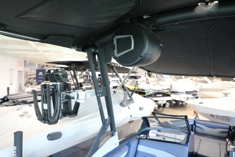 Slide: The Image of 2024 Axis T250 boat interior with mounted speaker and equipment rack. - 18